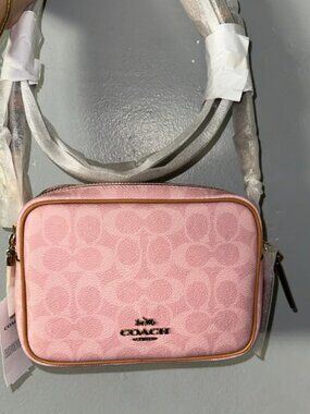 Coach Mini Carey Crossbody Bag In Powder Pink